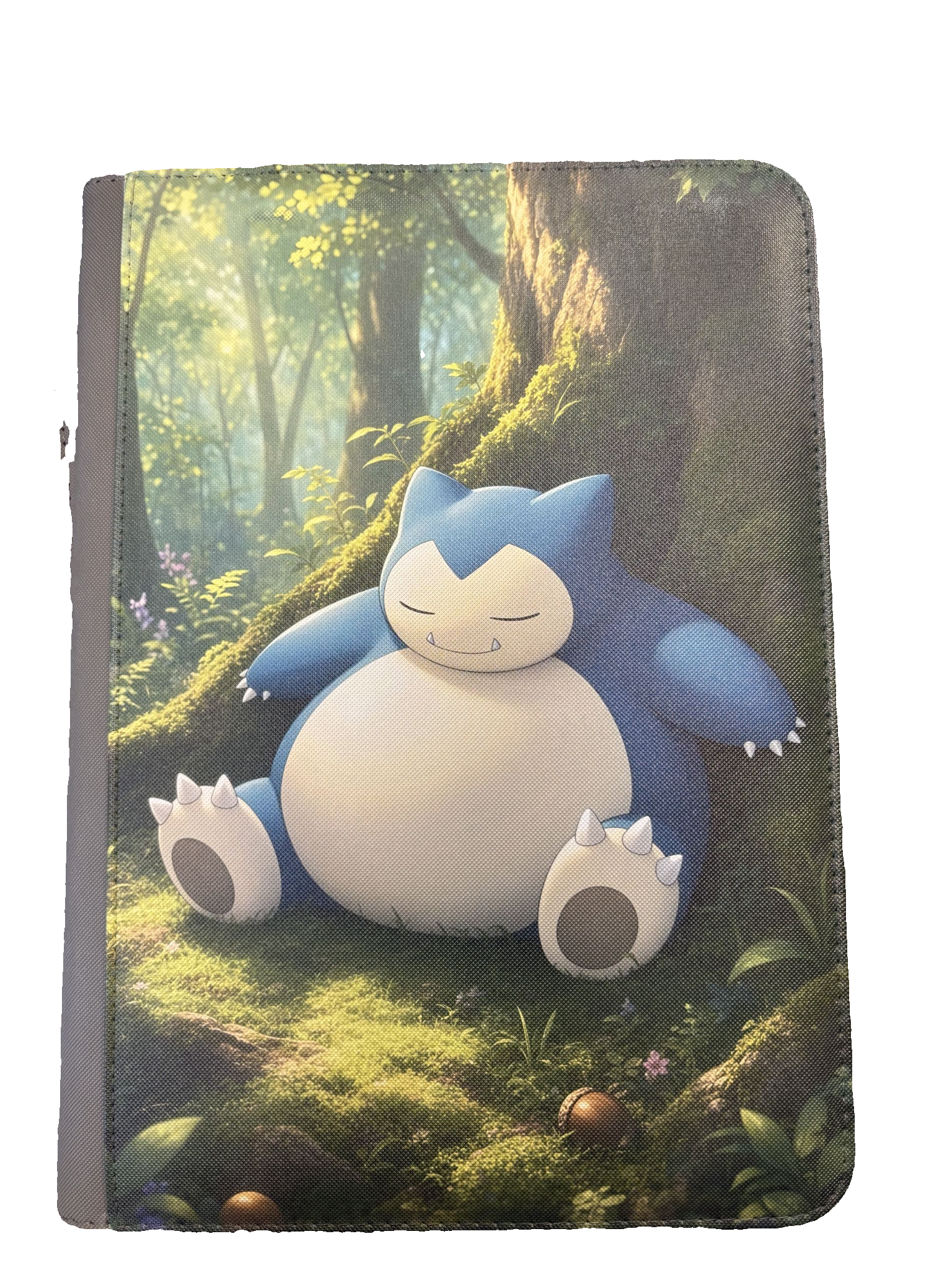 UV-tryckt binder med Snorlax i en skog
